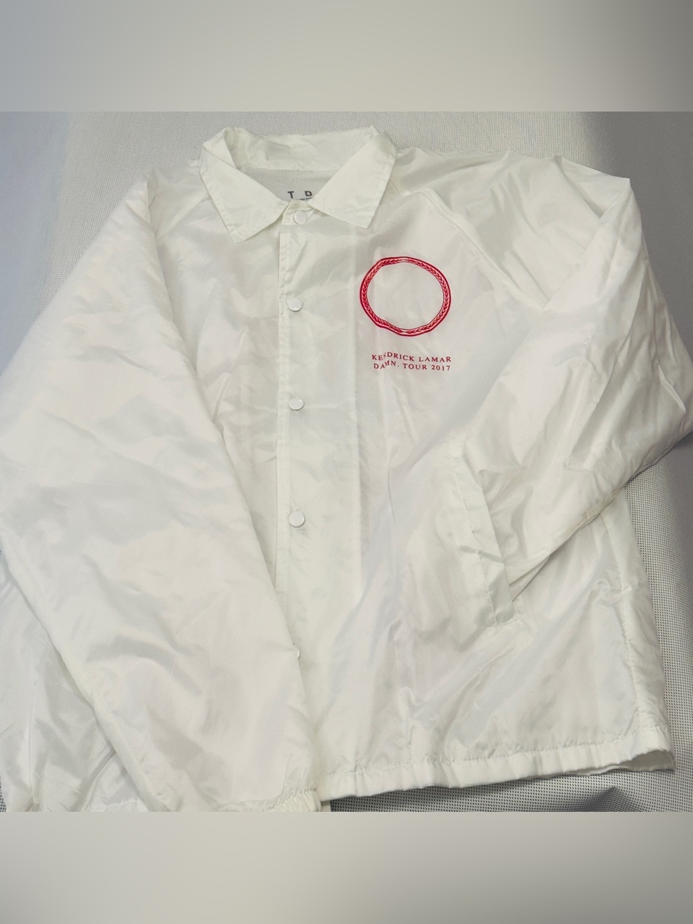 Kendrick Lamar DAMN. Tour White Coach Jacket with Red Logo
